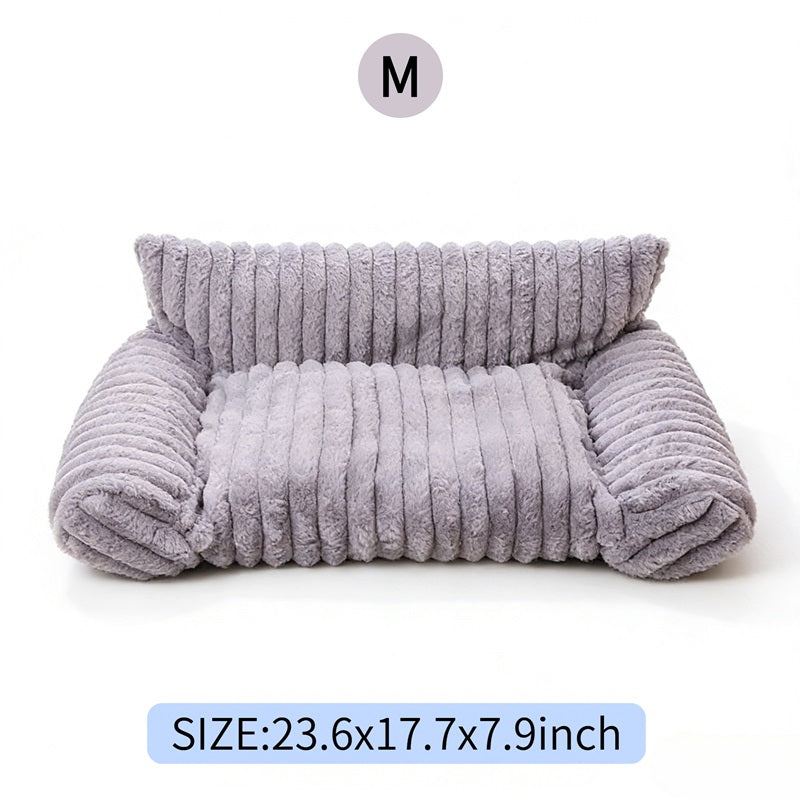 Cream colored corduroy kitten sofa with thick padded side armrests for comfort
