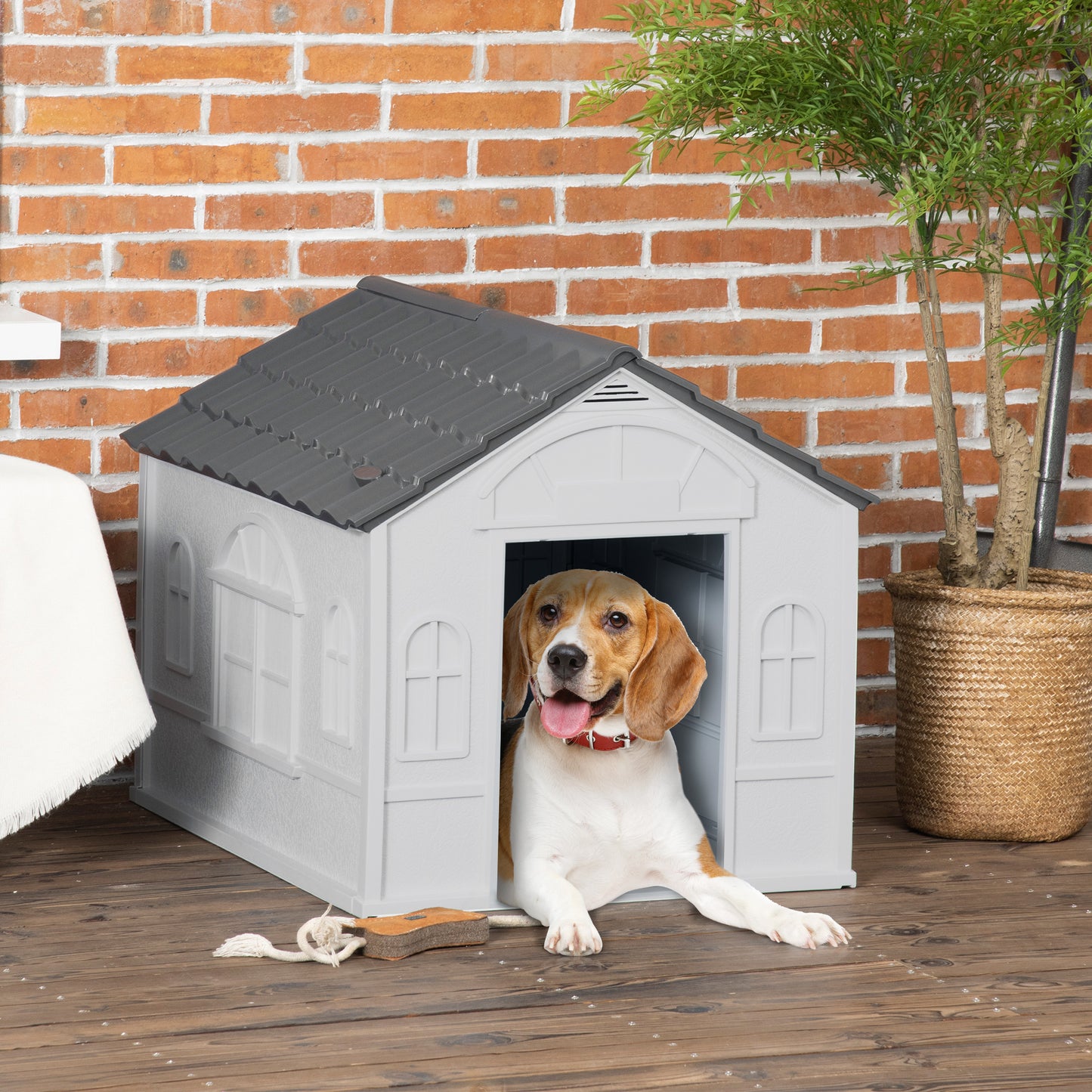 Durable plastic outdoor dog house dimensions infographic with dark grey shingle roof